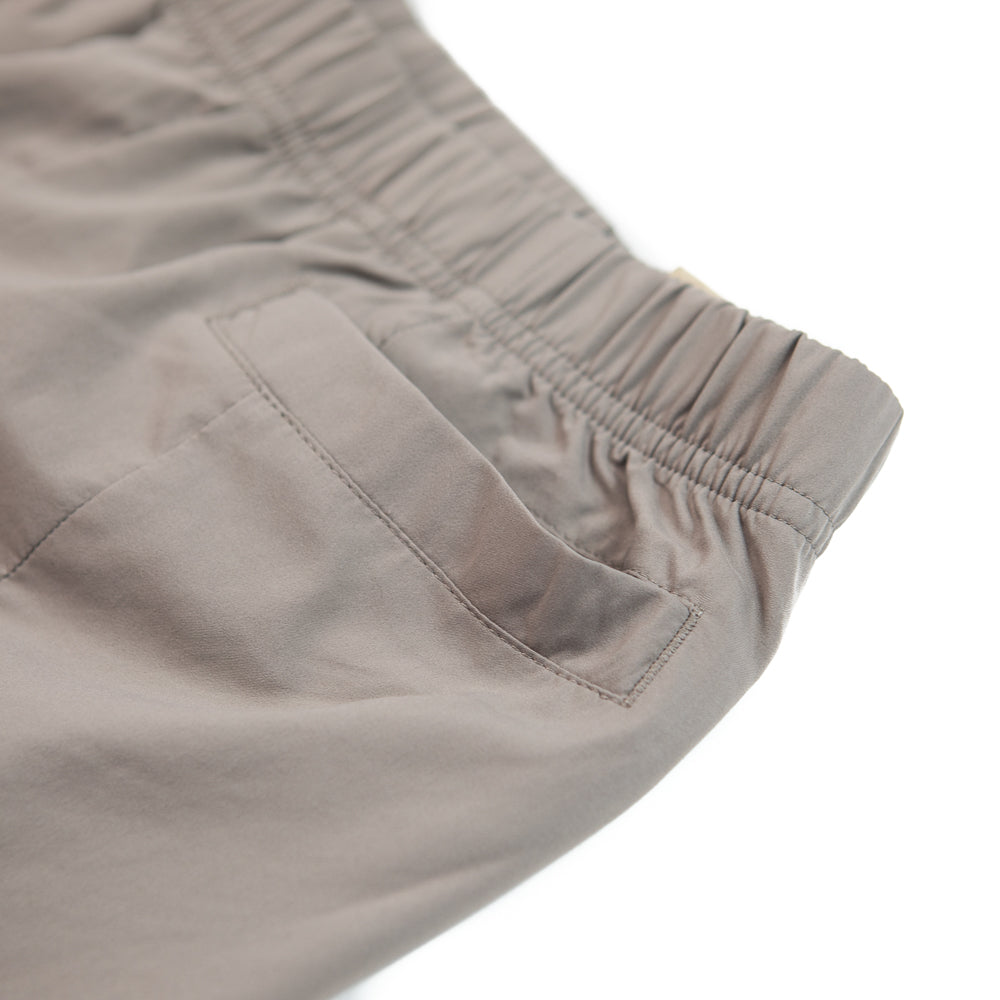 WMNS NSW Dri-FIT Tech Pack High-Rise Woven Trousers (Moon Fossil/Cave Stone)