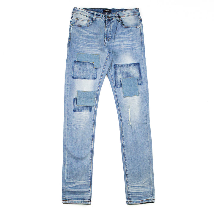 The McQueen Slim-Fit Denim Jean (Patched Up Indigo)